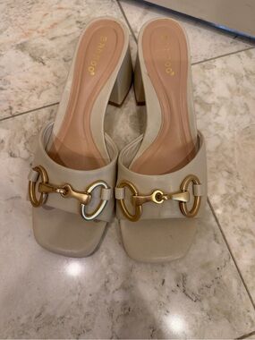 BAMBOO Cream Slide Mules with Gold Horsebit Detail